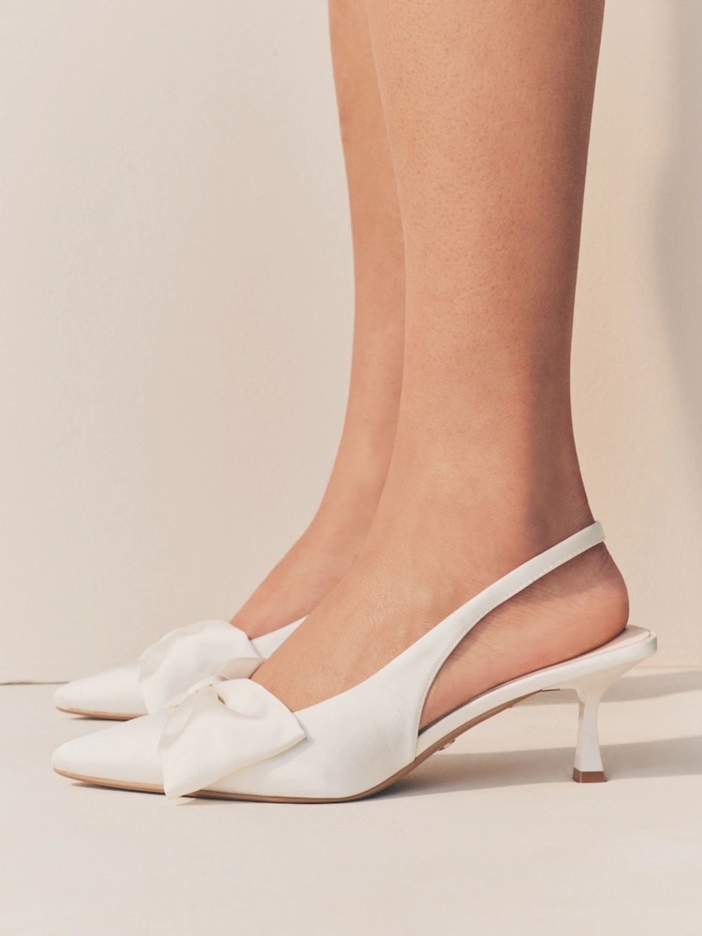 White Slingback Bow Kitten-Heel Pumps